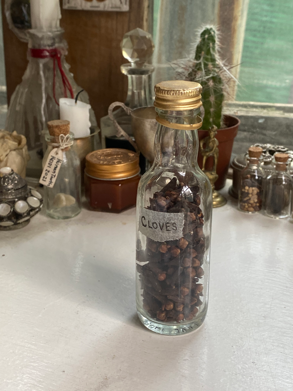 Cloves in Glass Bottle image 0