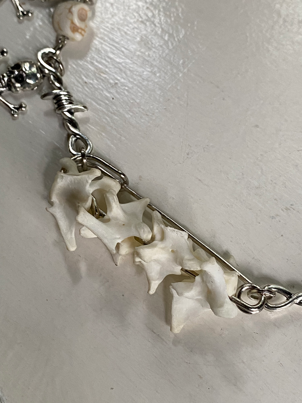 Mink Vertibrae on Safety Pin and Skulls Necklace image 2