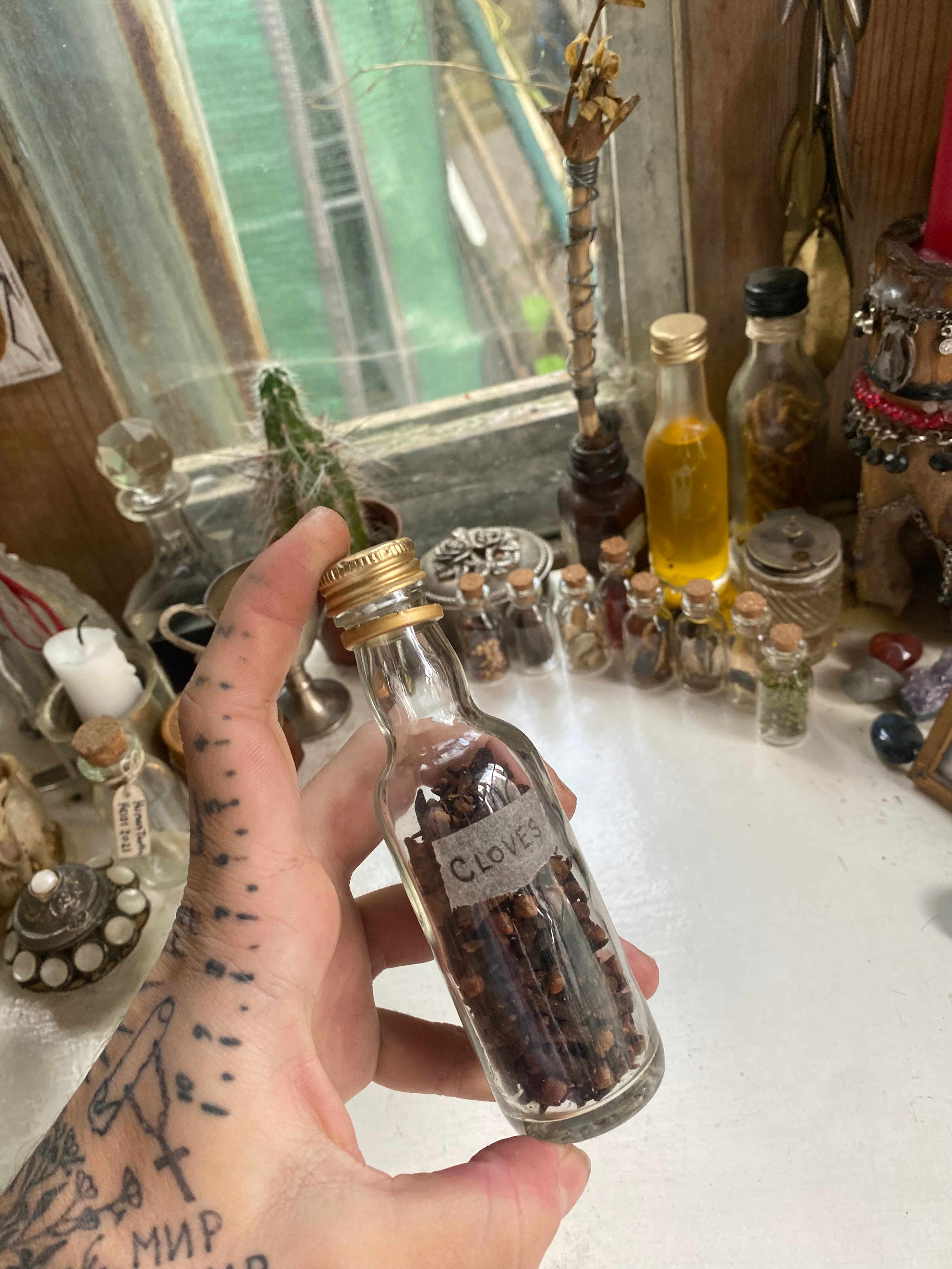 Cloves in Glass Bottle image 1