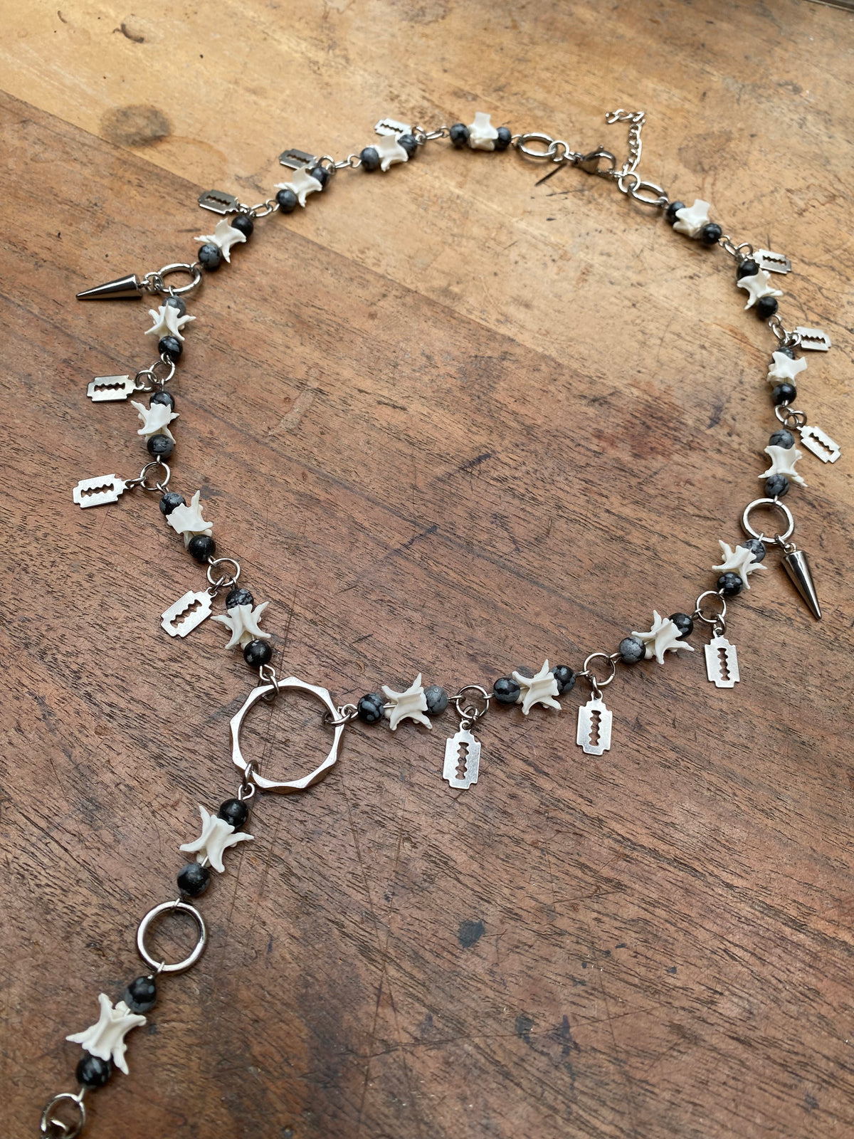 Inverted Crucifix, Snake Vertibrae and Obsidian Rosary Necklace