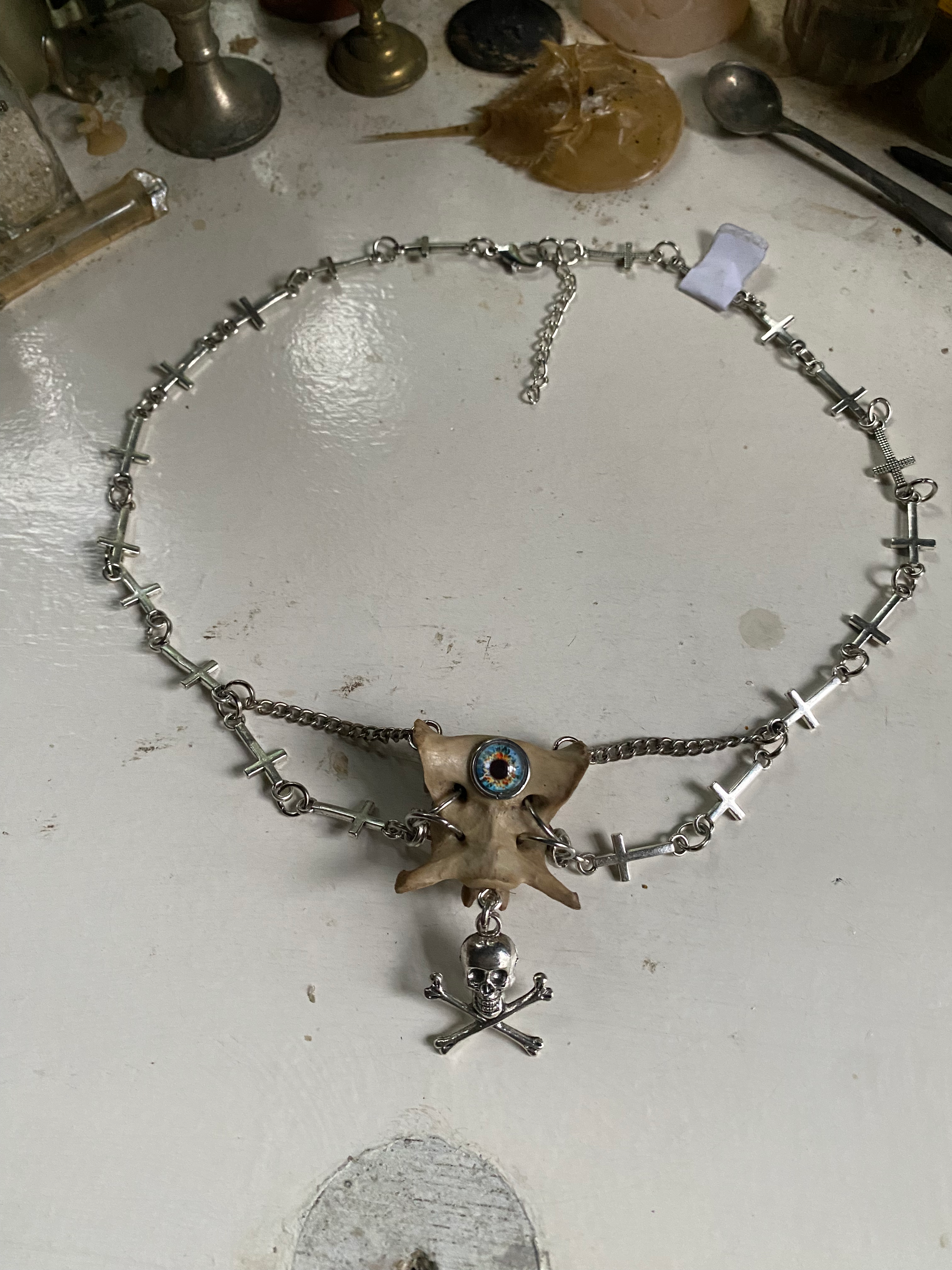 Tailbone, Eye and Crosses Necklace image 0