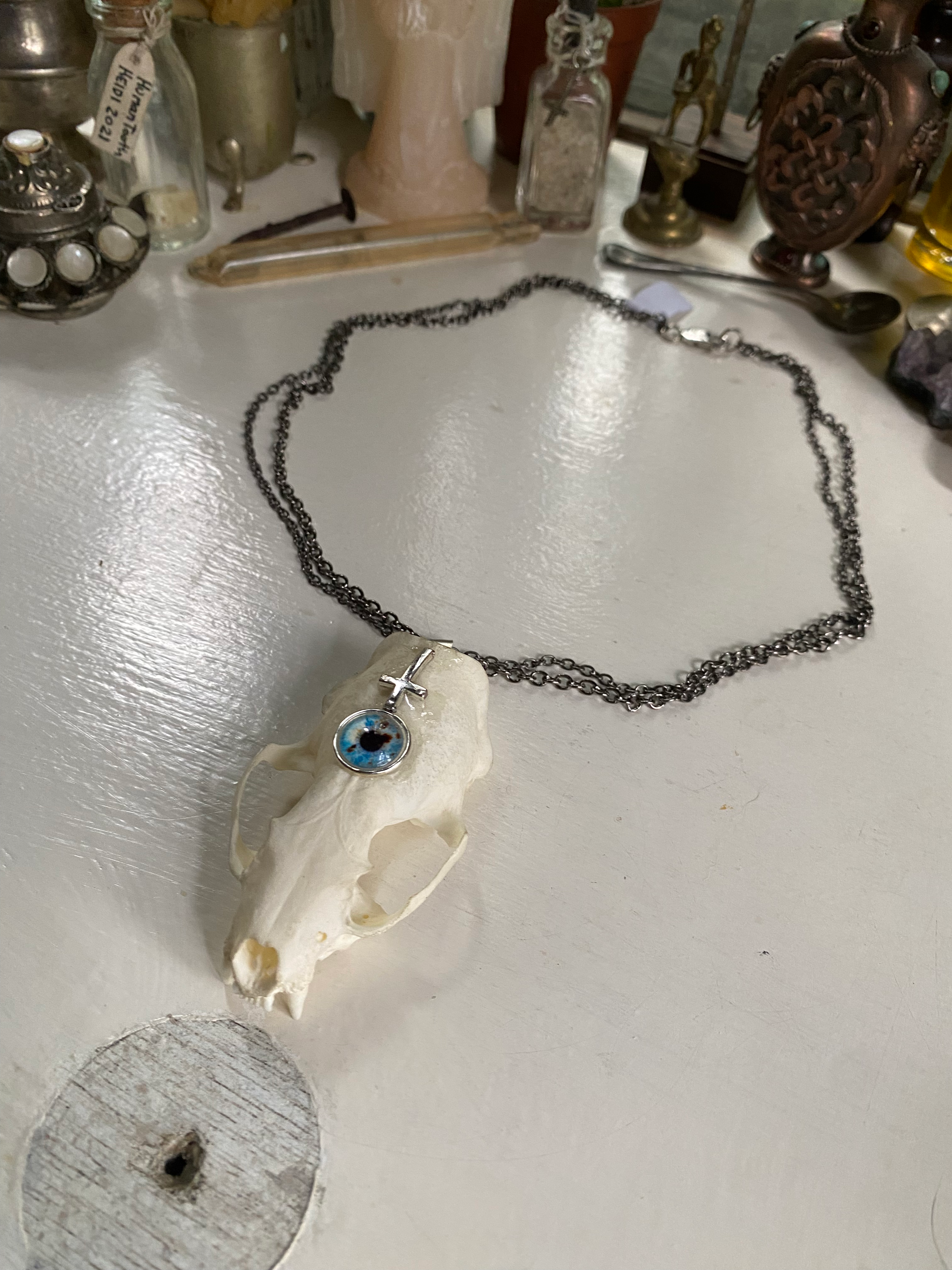 Mink Skull with Inverted Cross and Eye Necklace image 0