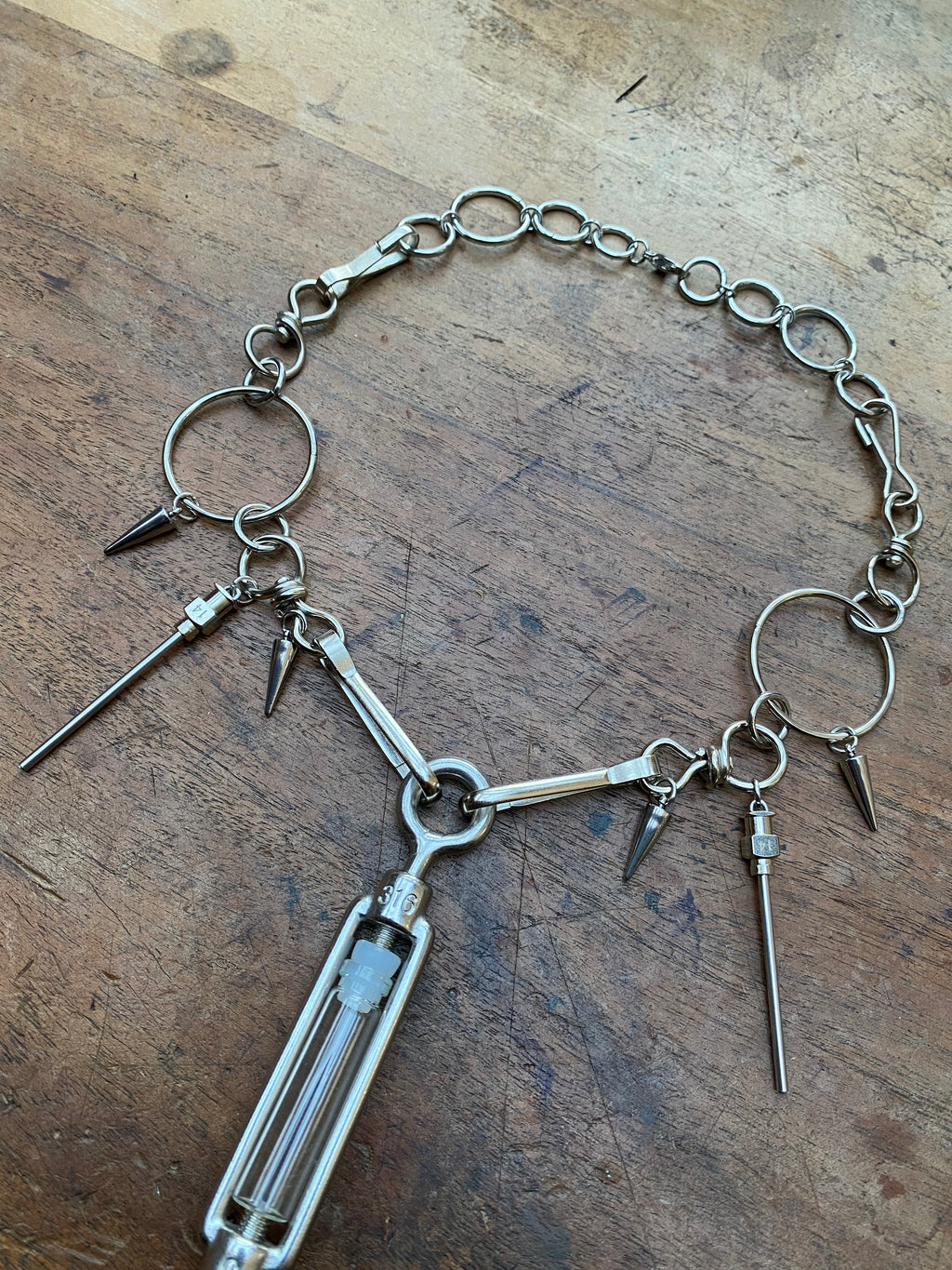 Stainless Steel Mechanical Hook, Syringe Needles and Glass Vial Necklace