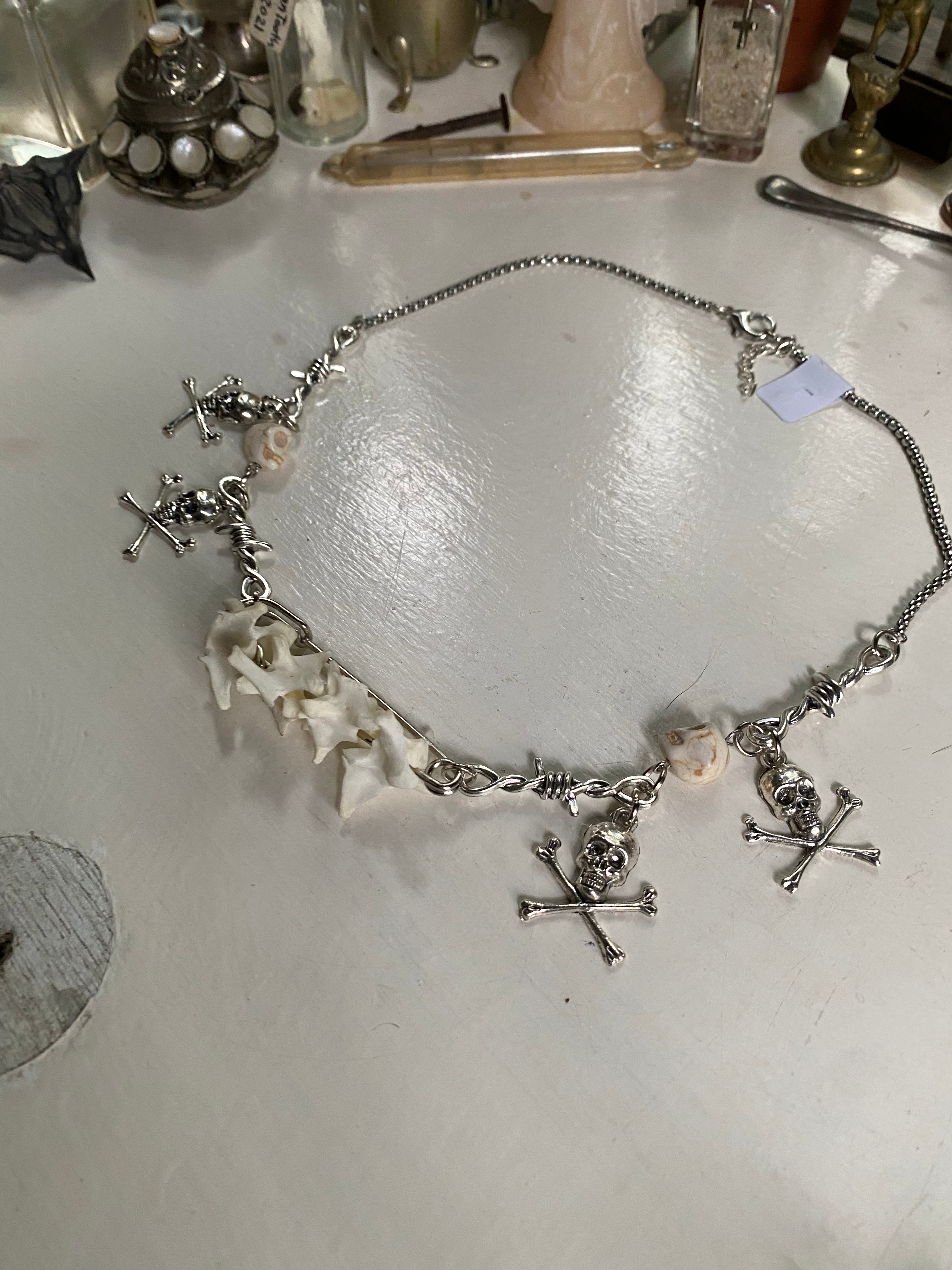 Mink Vertibrae on Safety Pin and Skulls Necklace image 1