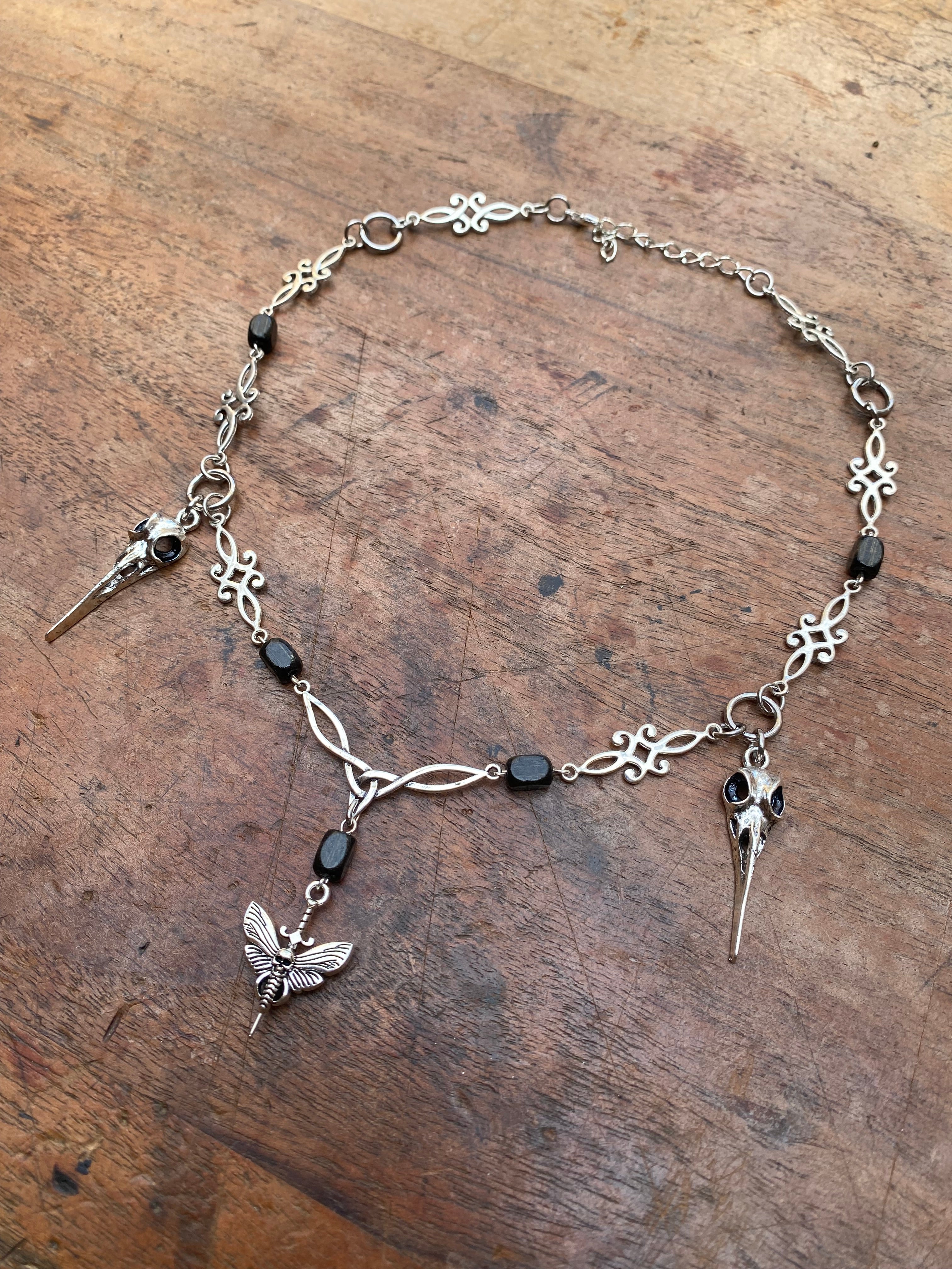 Moth, Bird Skulls and Wood Beads Necklace