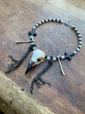 Crow Skull and Feet Necklace with Snake Vertibrae and Lava Rock