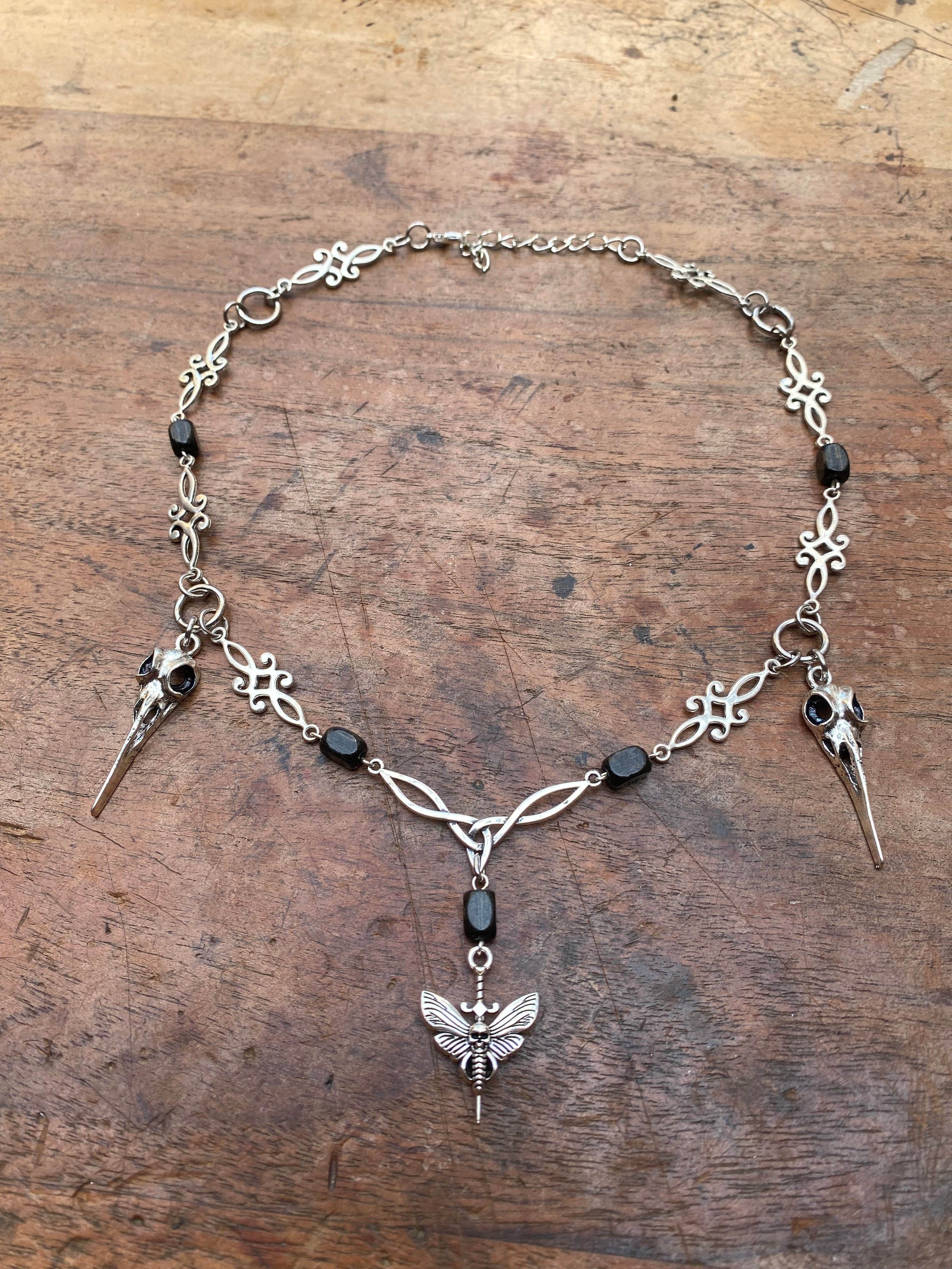 Moth, Bird Skulls and Wood Beads Necklace