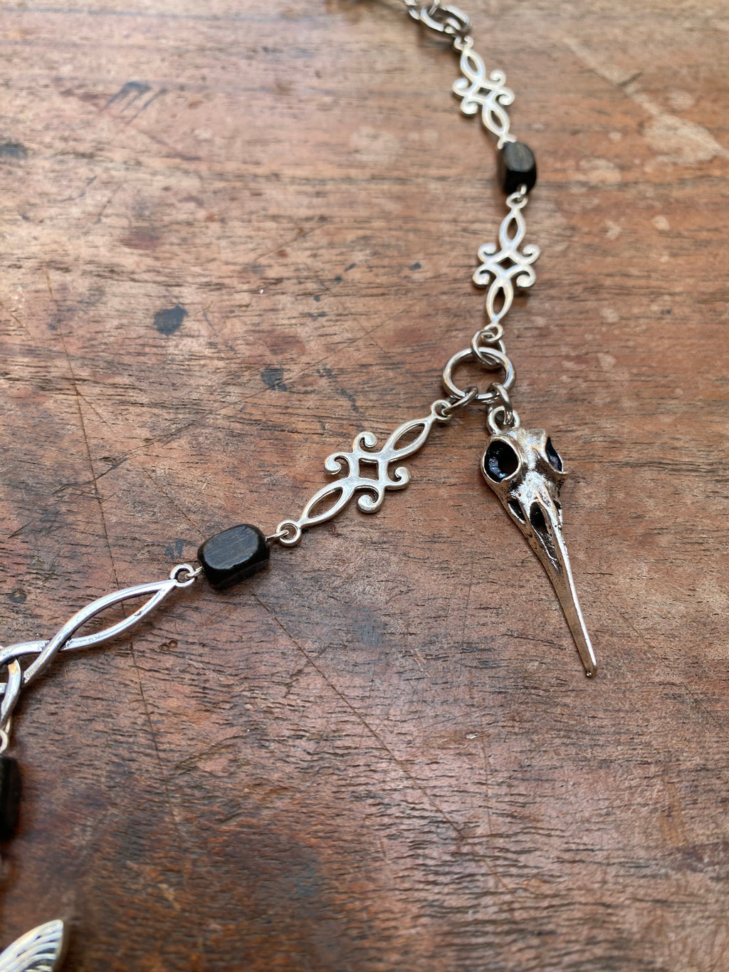 Moth, Bird Skulls and Wood Beads Necklace