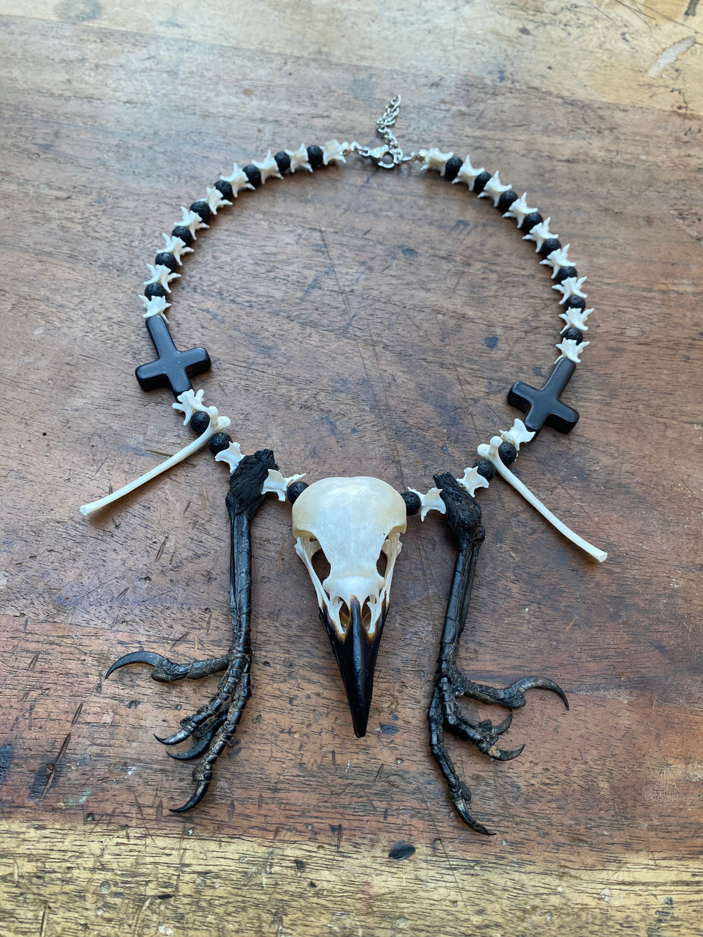 Crow Skull and Feet Necklace with Snake Vertibrae and Lava Rock