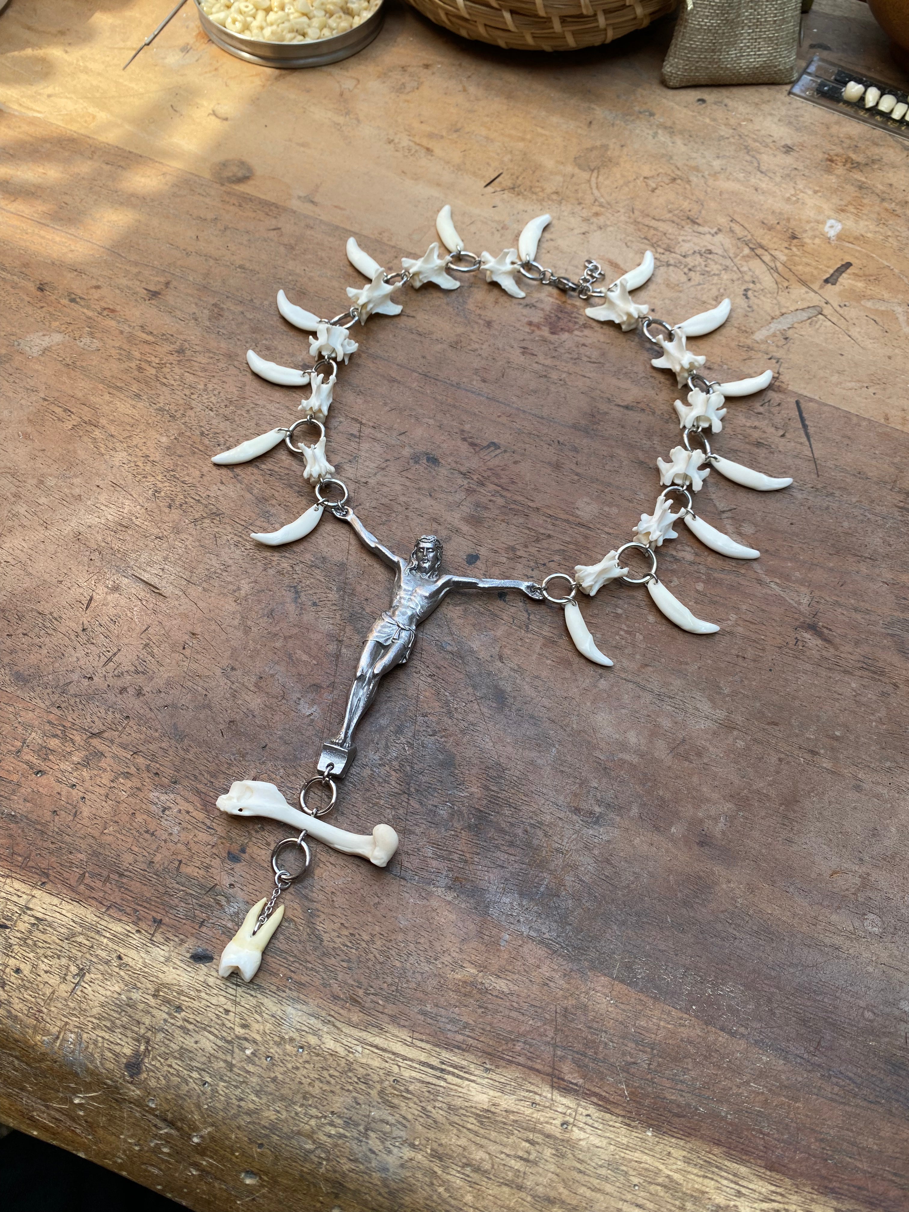Human Tooth Crucified Jesus Necklace with Mink Vertibrae and Coyote Teeth