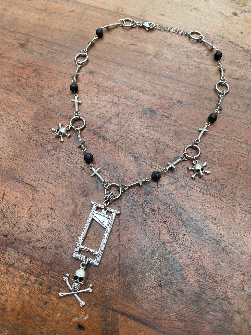 Guillotine, Skulls and Volcanic Rock Necklace