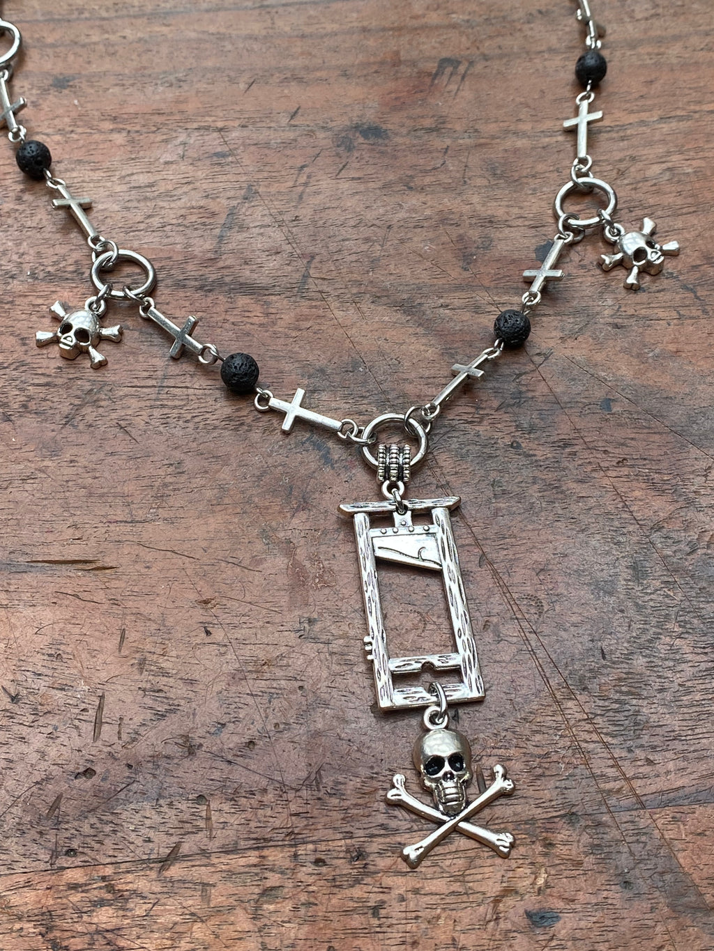 Guillotine, Skulls and Volcanic Rock Necklace