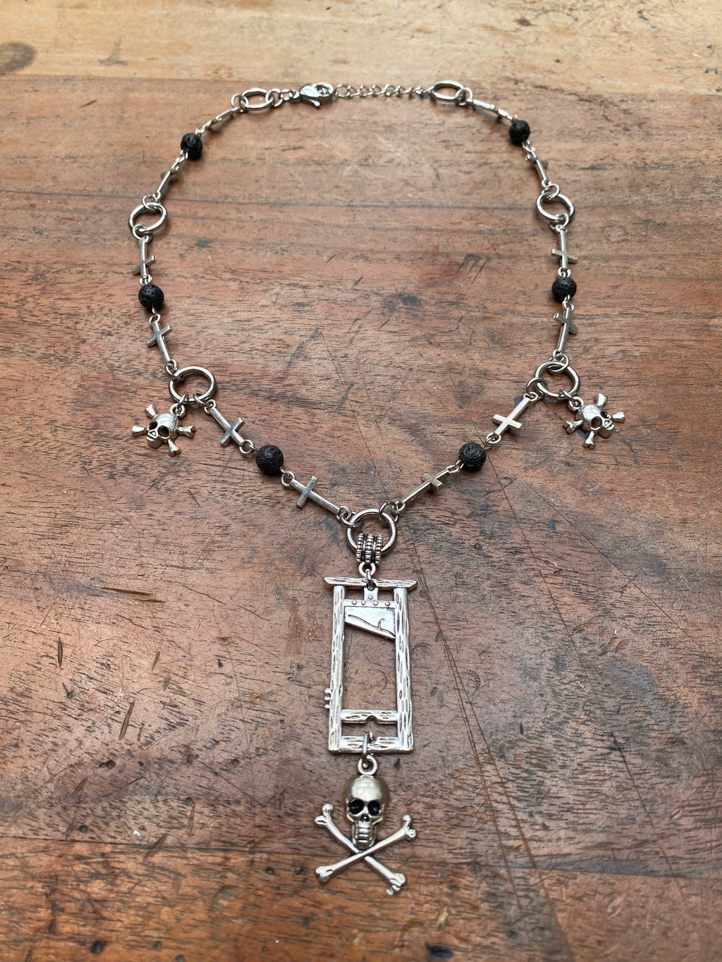 Guillotine, Skulls and Volcanic Rock Necklace