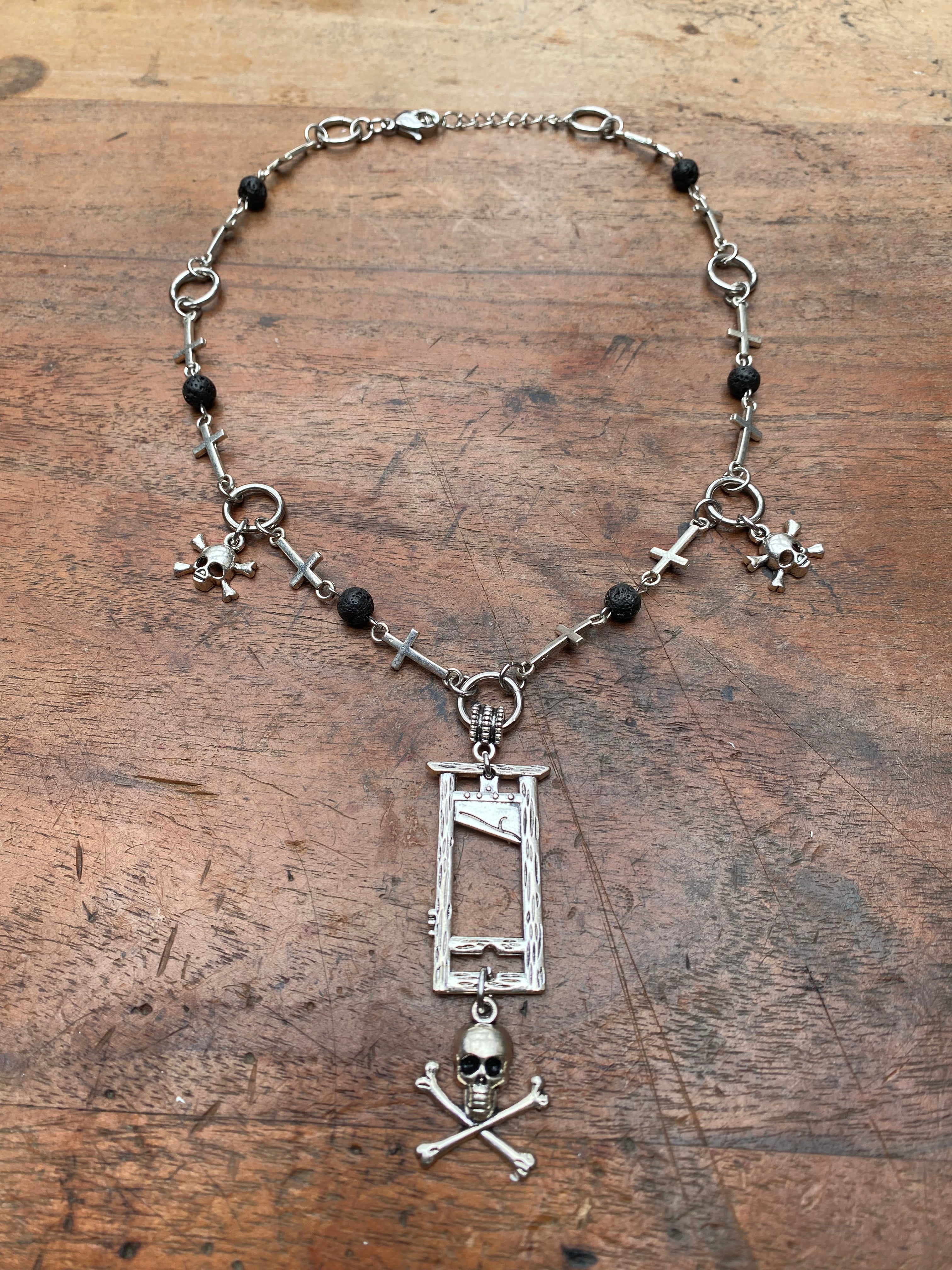 Guillotine, Skulls and Volcanic Rock Necklace