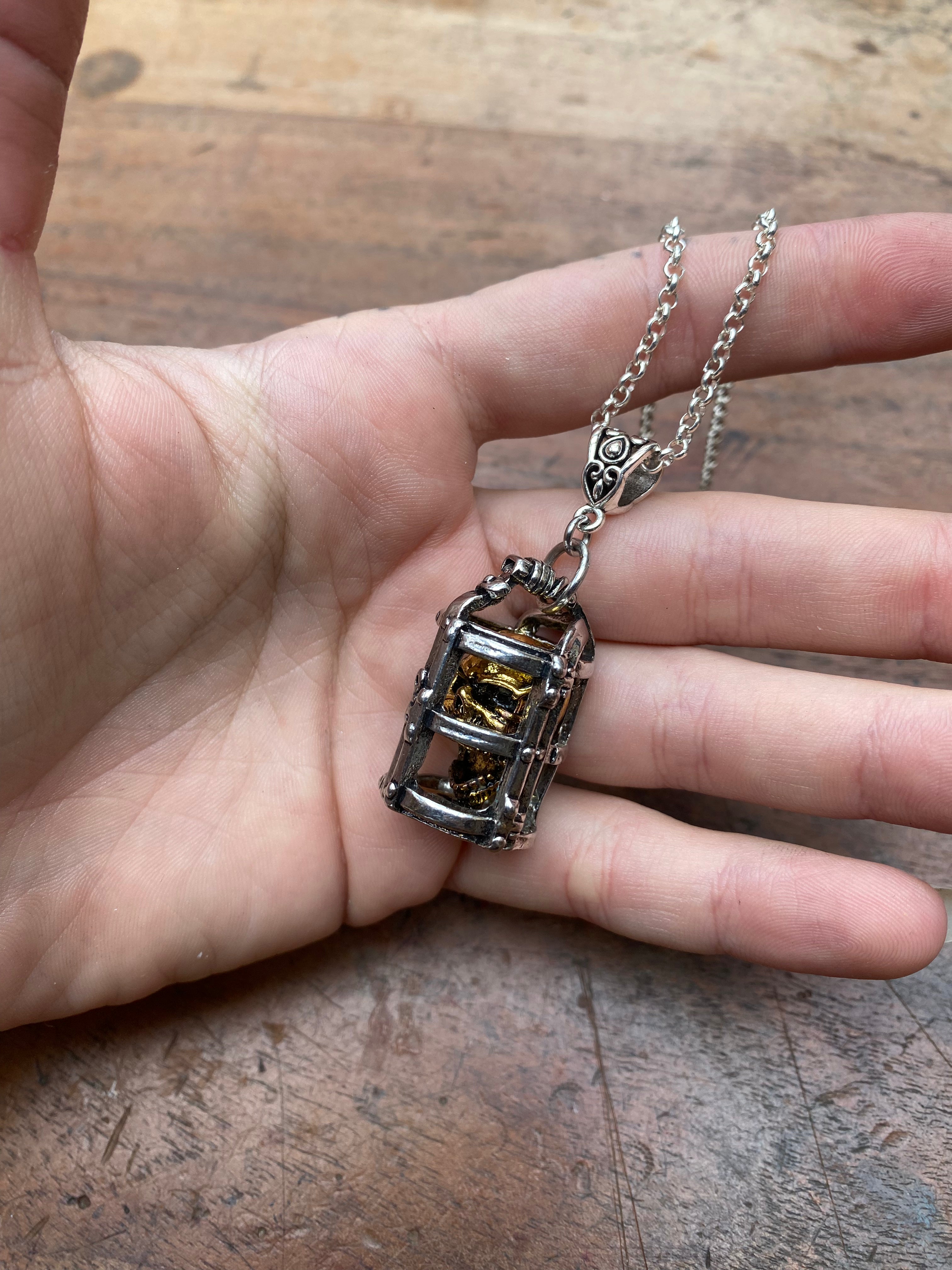 Gold Skull in Silver Cage Pendant Necklace