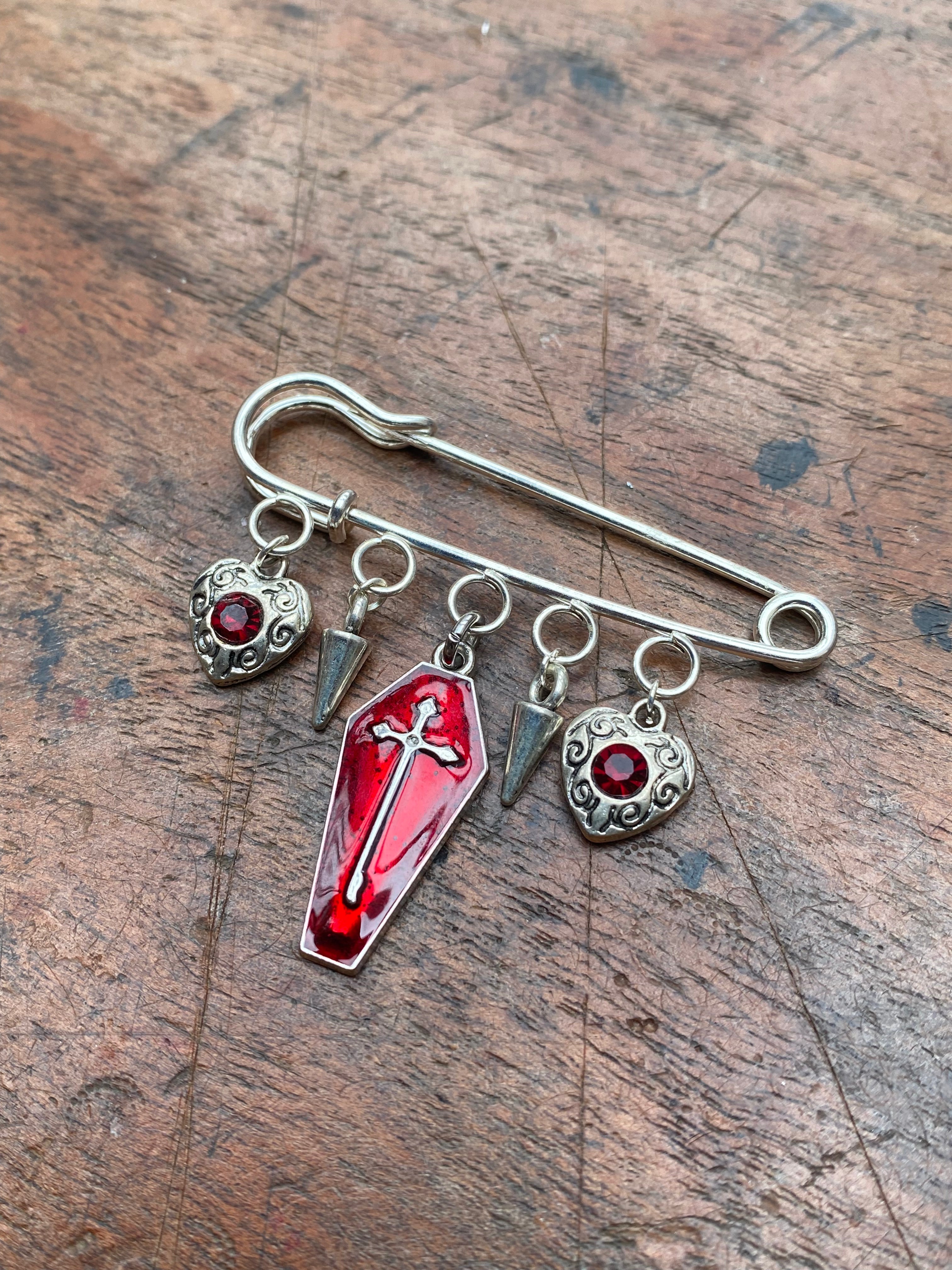 Coffin Charm and Red Gemstone Safety Pin Brooch