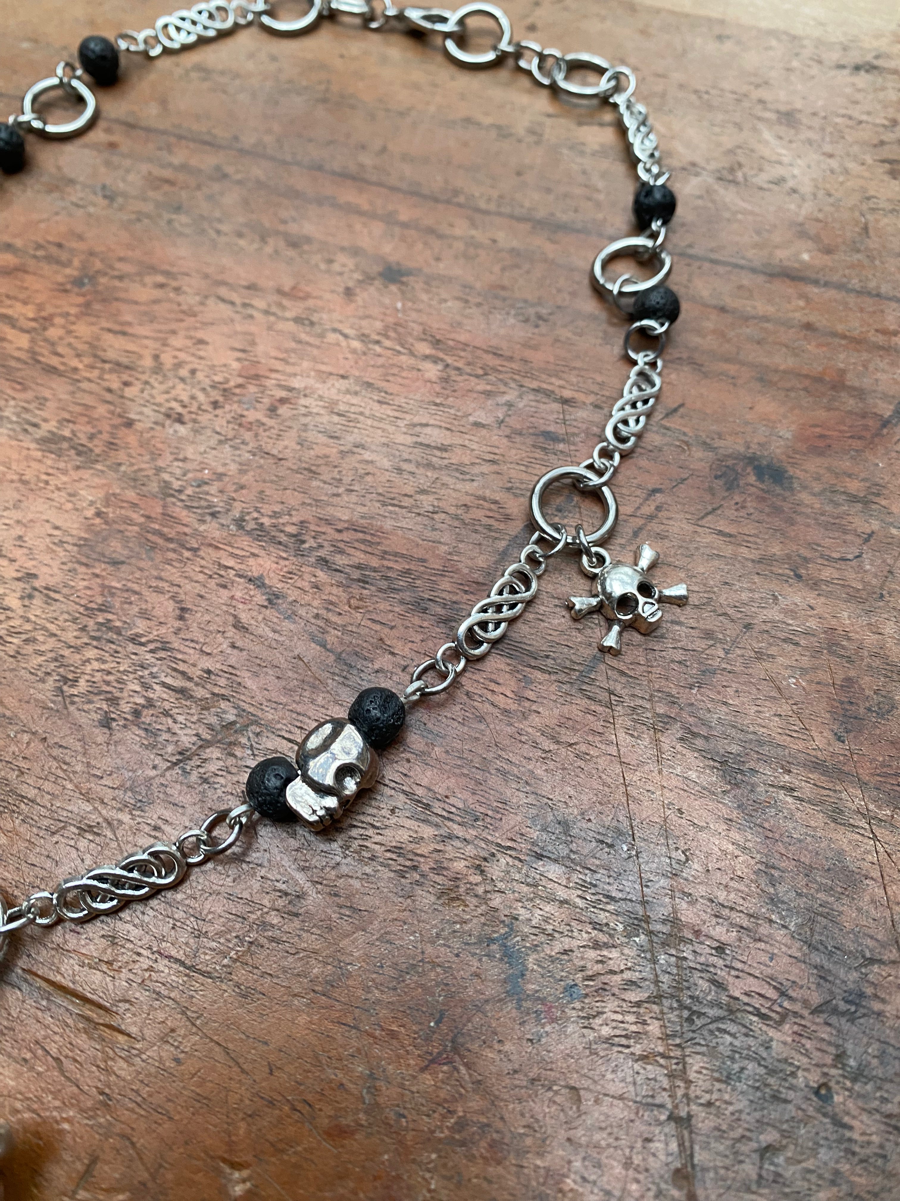 Skull and Bones Crucifix with Volcanic Rock Necklace