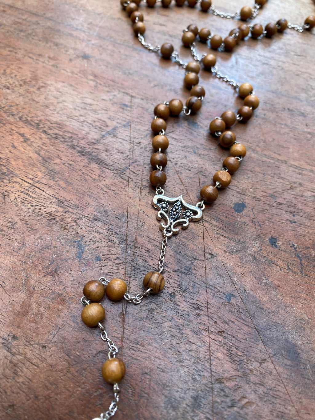Wooden Bead Rosary with Bird Skull