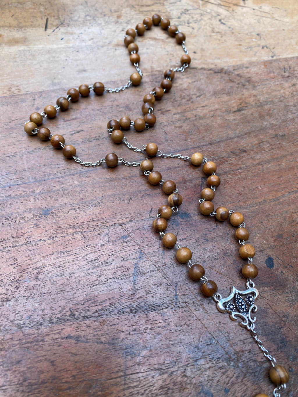 Wooden Bead Rosary with Bird Skull