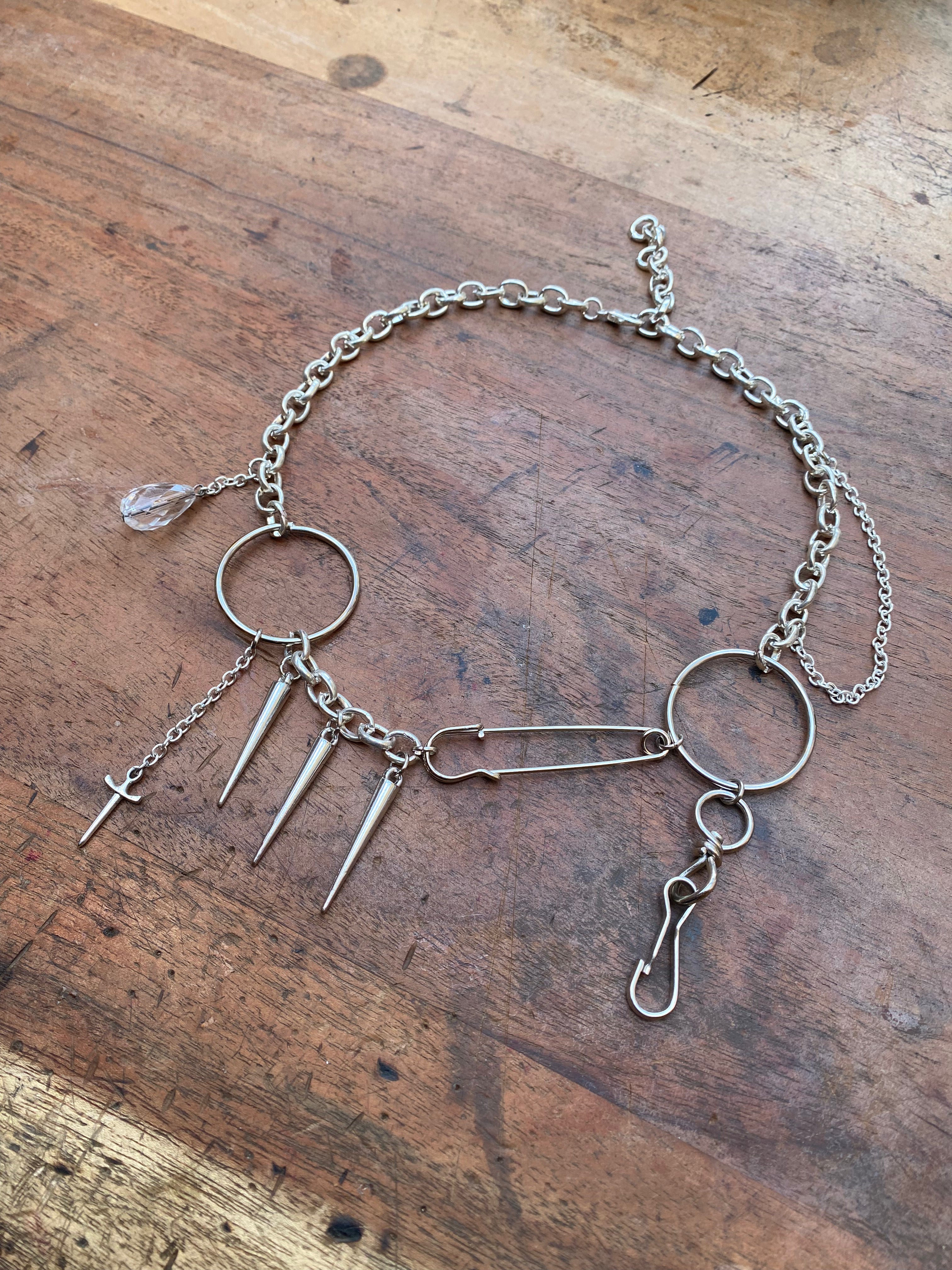 Asymmetrical Safety Pin, Spikes and Rings Necklace