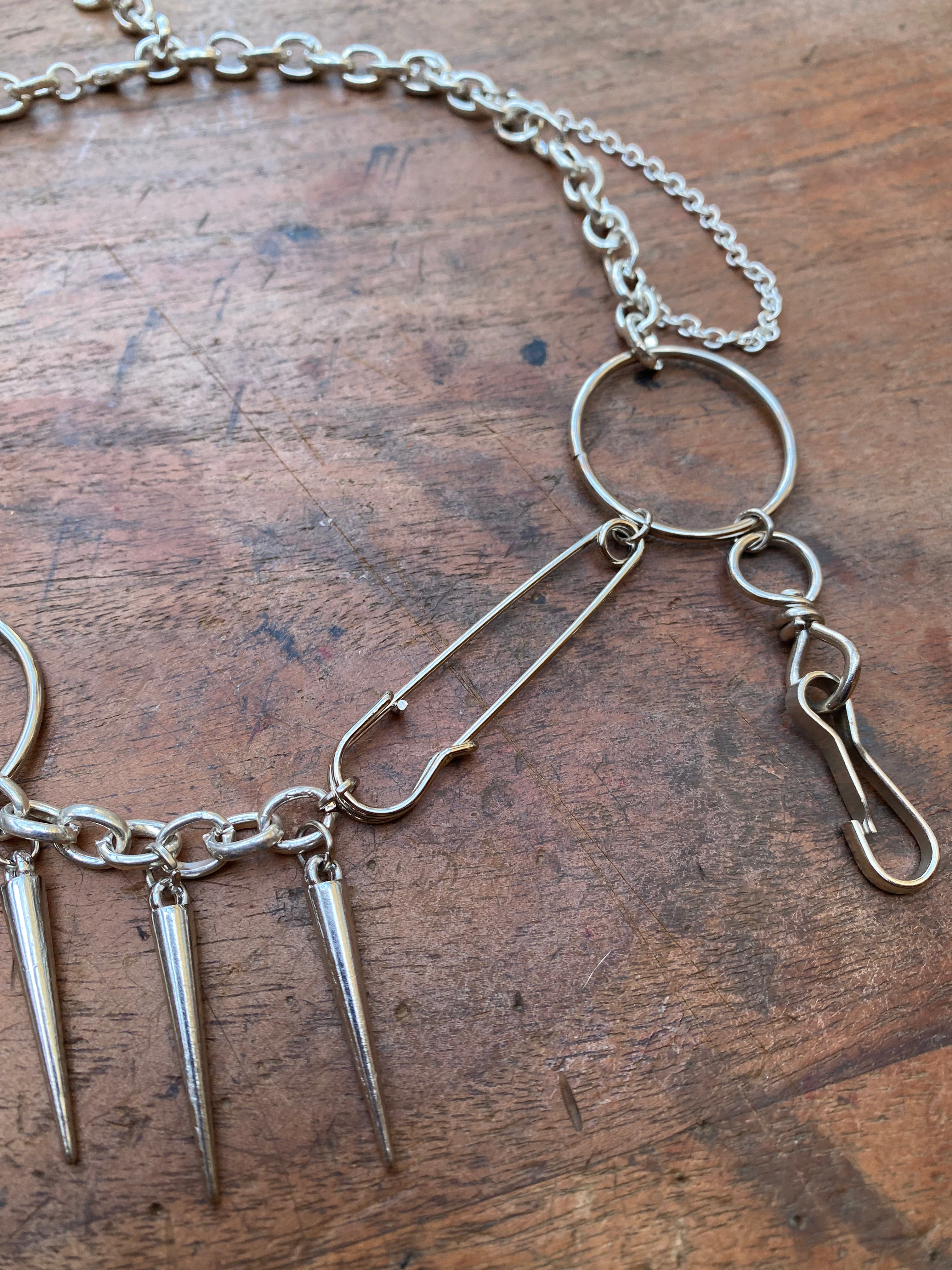 Asymmetrical Safety Pin, Spikes and Rings Necklace