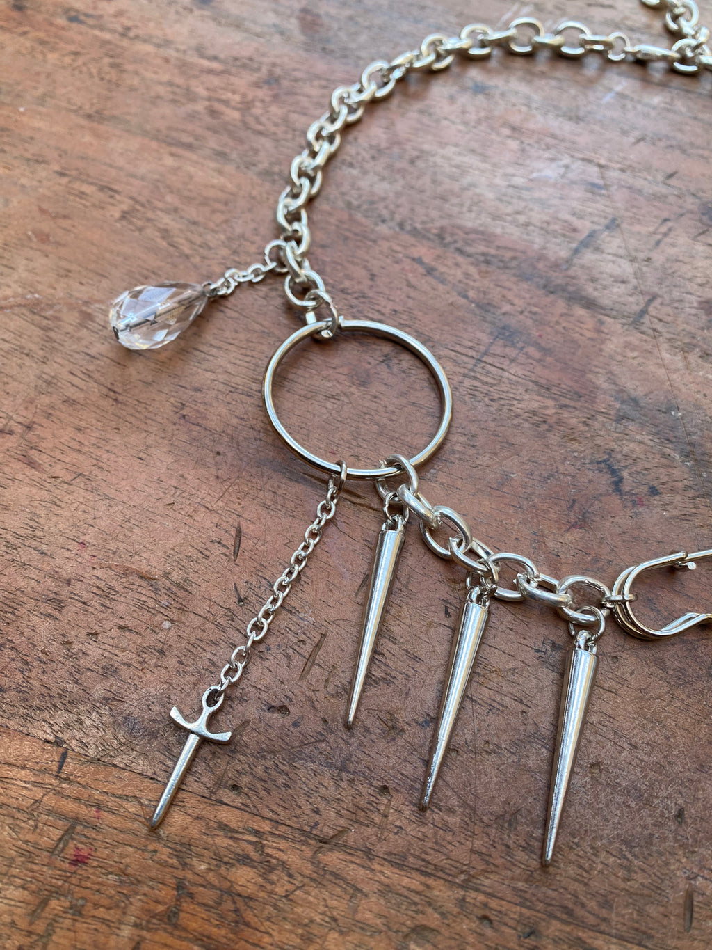 Asymmetrical Safety Pin, Spikes and Rings Necklace