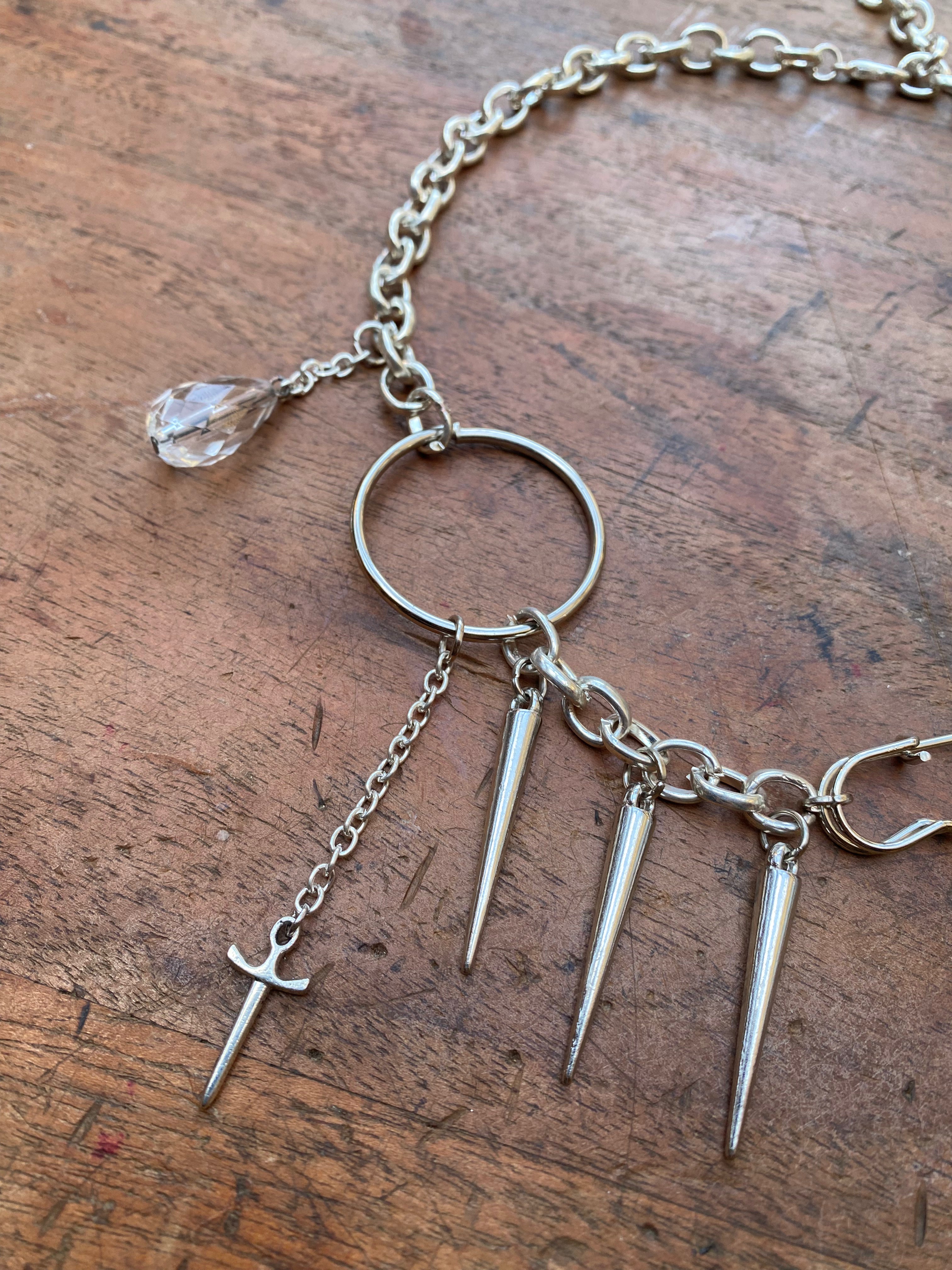 Asymmetrical Safety Pin, Spikes and Rings Necklace