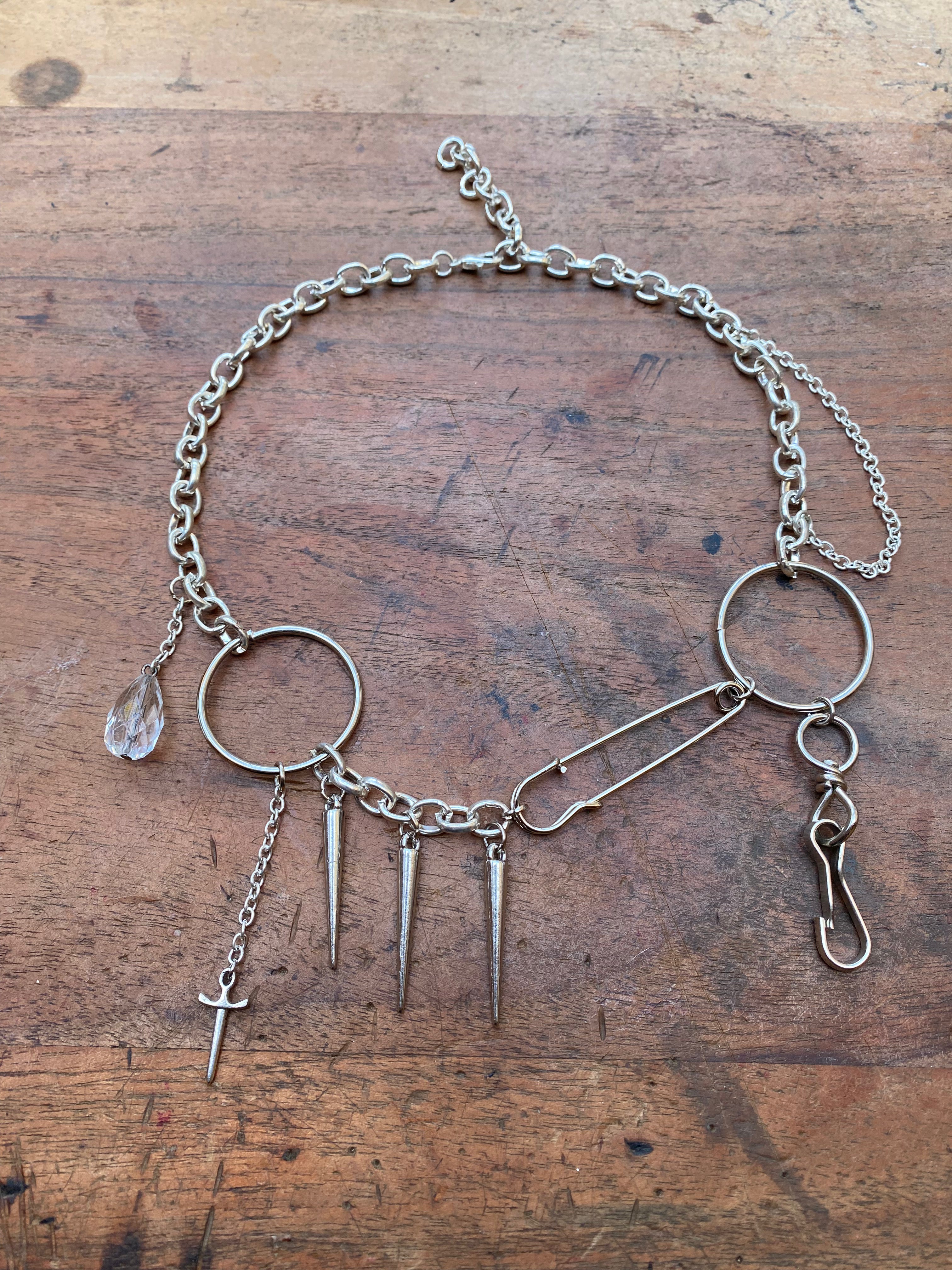 Asymmetrical Safety Pin, Spikes and Rings Necklace