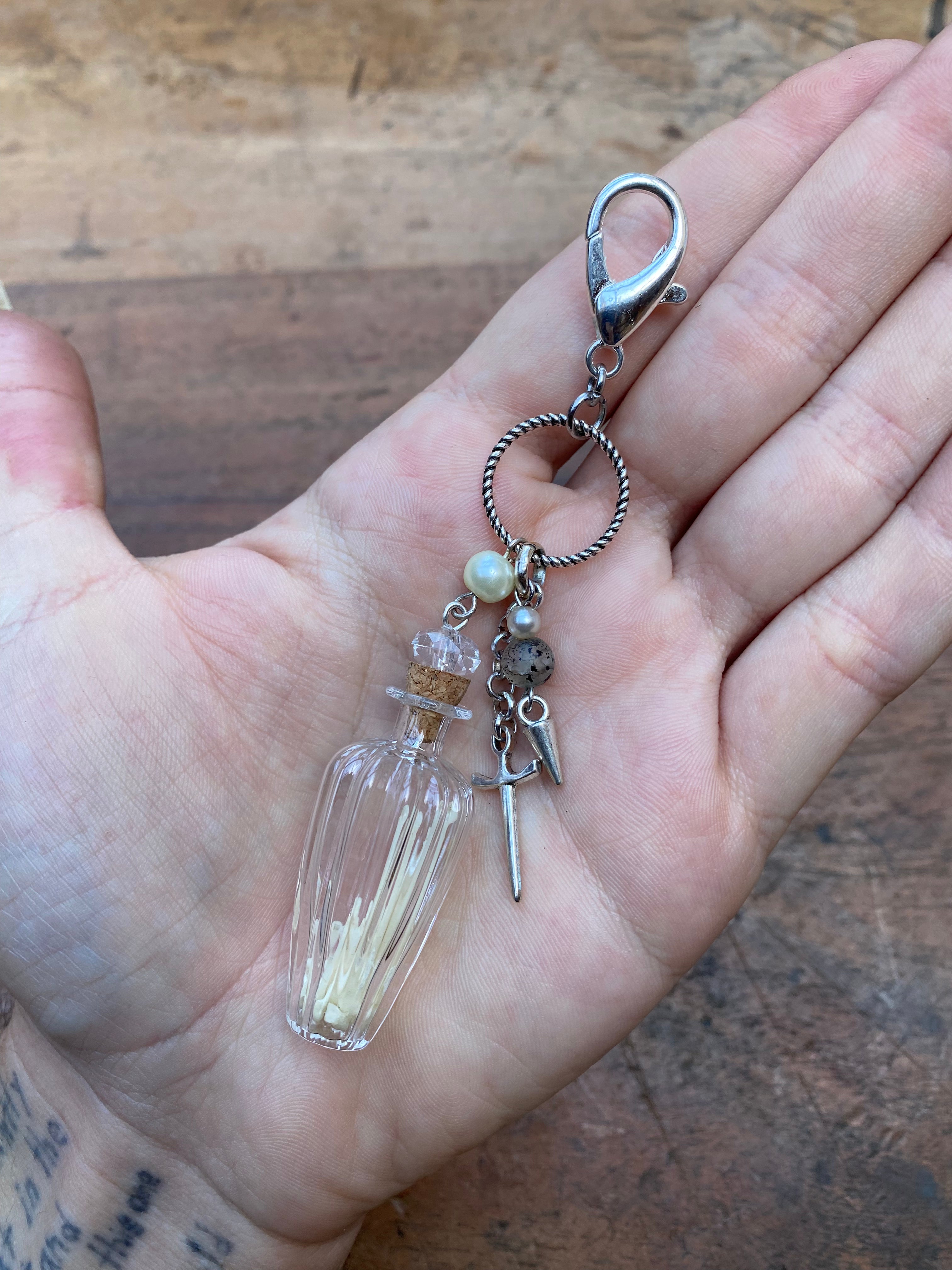 Glass Vial with Squirrel Bones Keychain