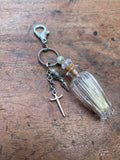 Glass Vial with Squirrel Bones Keychain