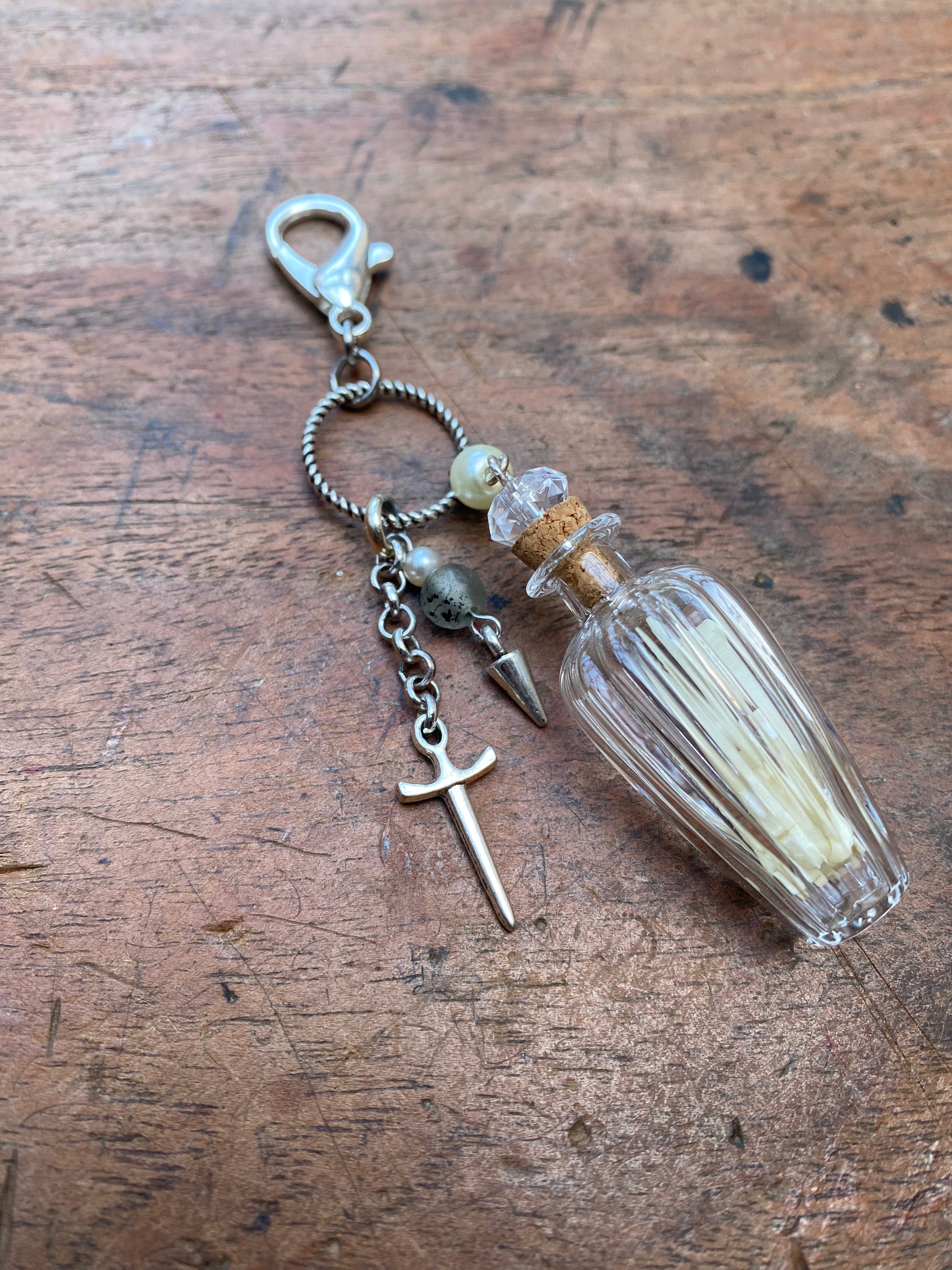 Glass Vial with Squirrel Bones Keychain