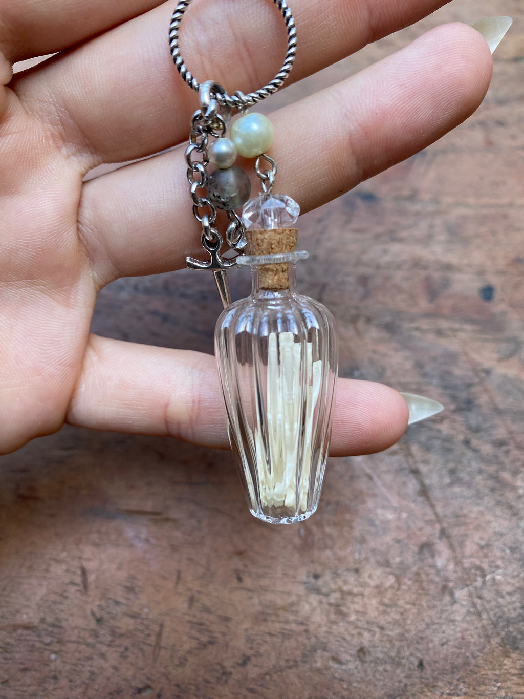 Glass Vial with Squirrel Bones Keychain