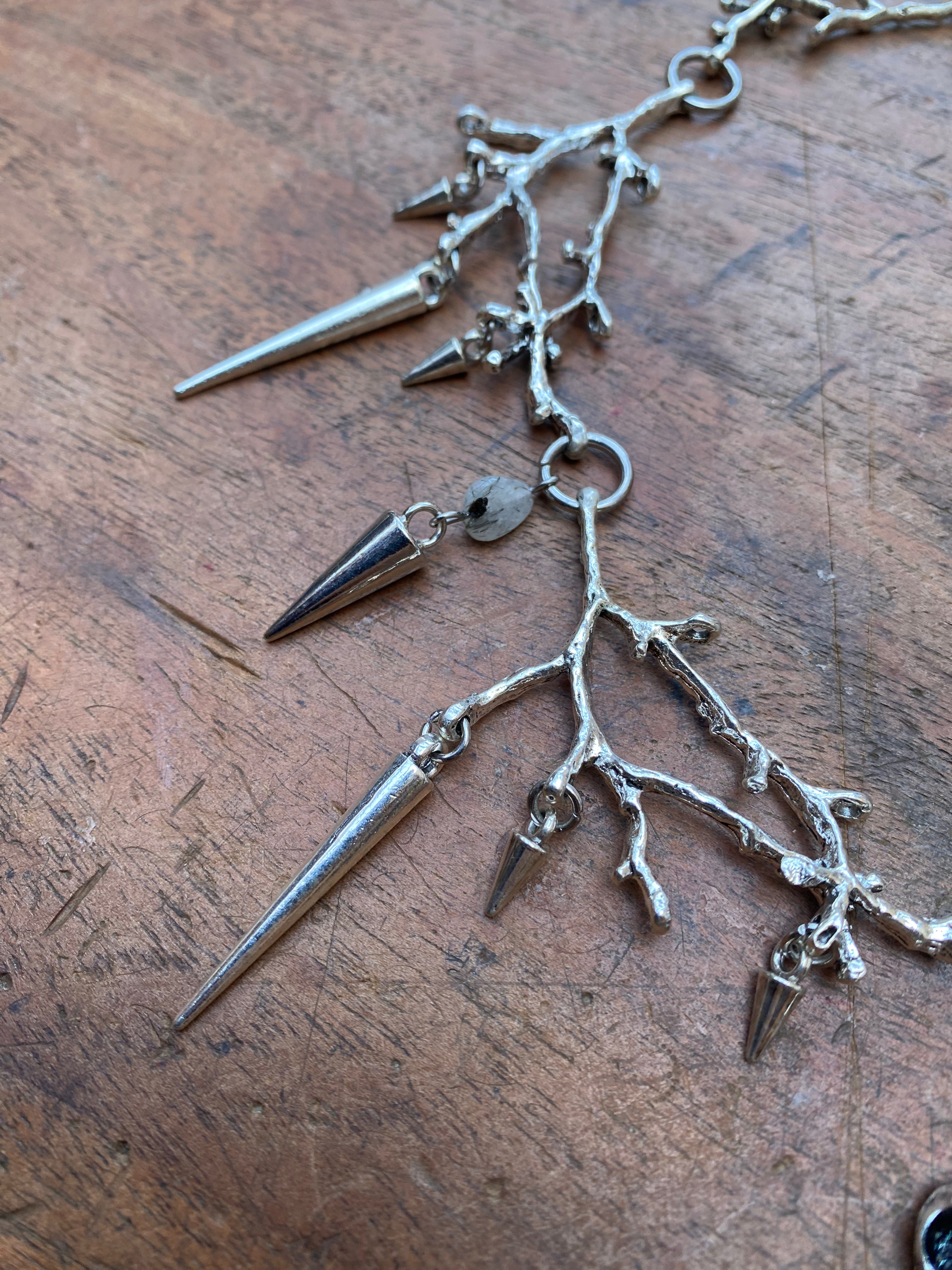 Branches, Spikes and Bird Skull with Rutilated Quartz Necklace