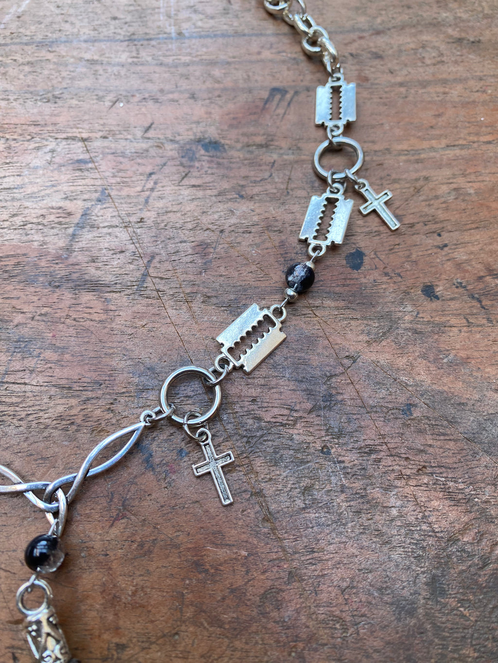 Crow Foot, Razor Blades and Cracked Glass Beads Necklace