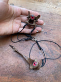 Mudlarked Veretebrae Bones with Eyes Pendulum
