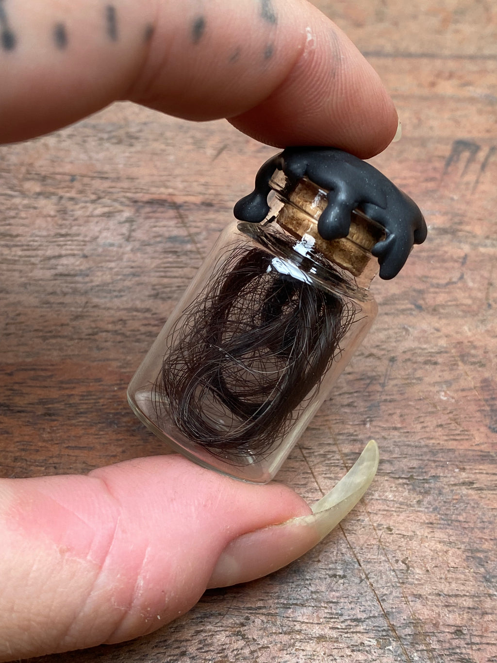 Human Hair in Glass Vial