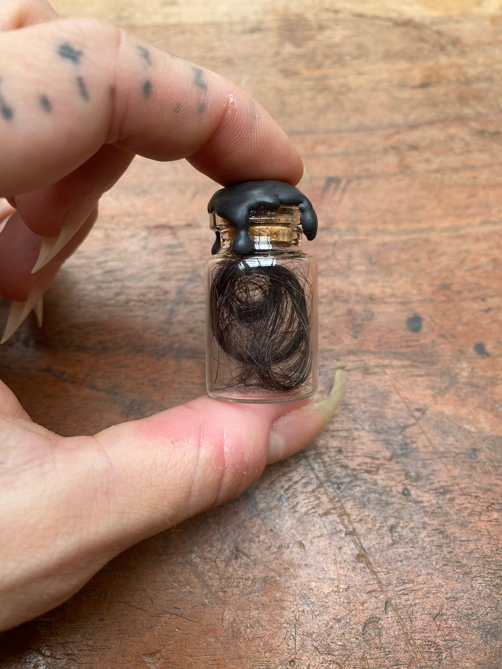 Human Hair in Glass Vial