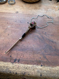Mudlarked Vertebrae with Red Eye and Nails Dagger Necklace