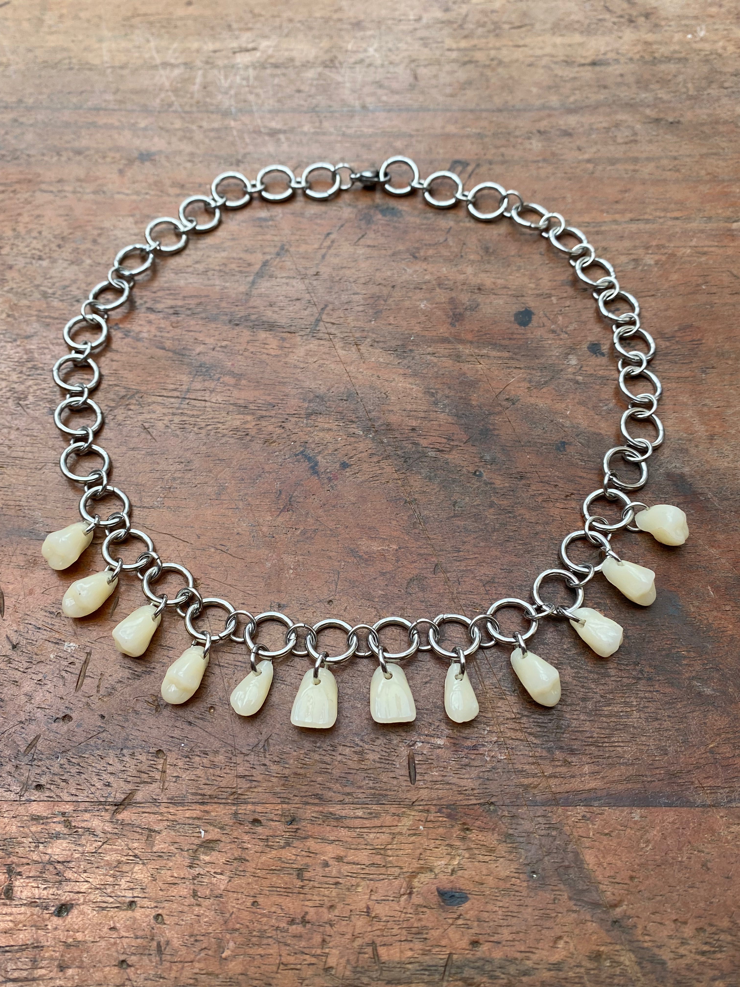 Resin Human Teeth and Steel Rings Necklace