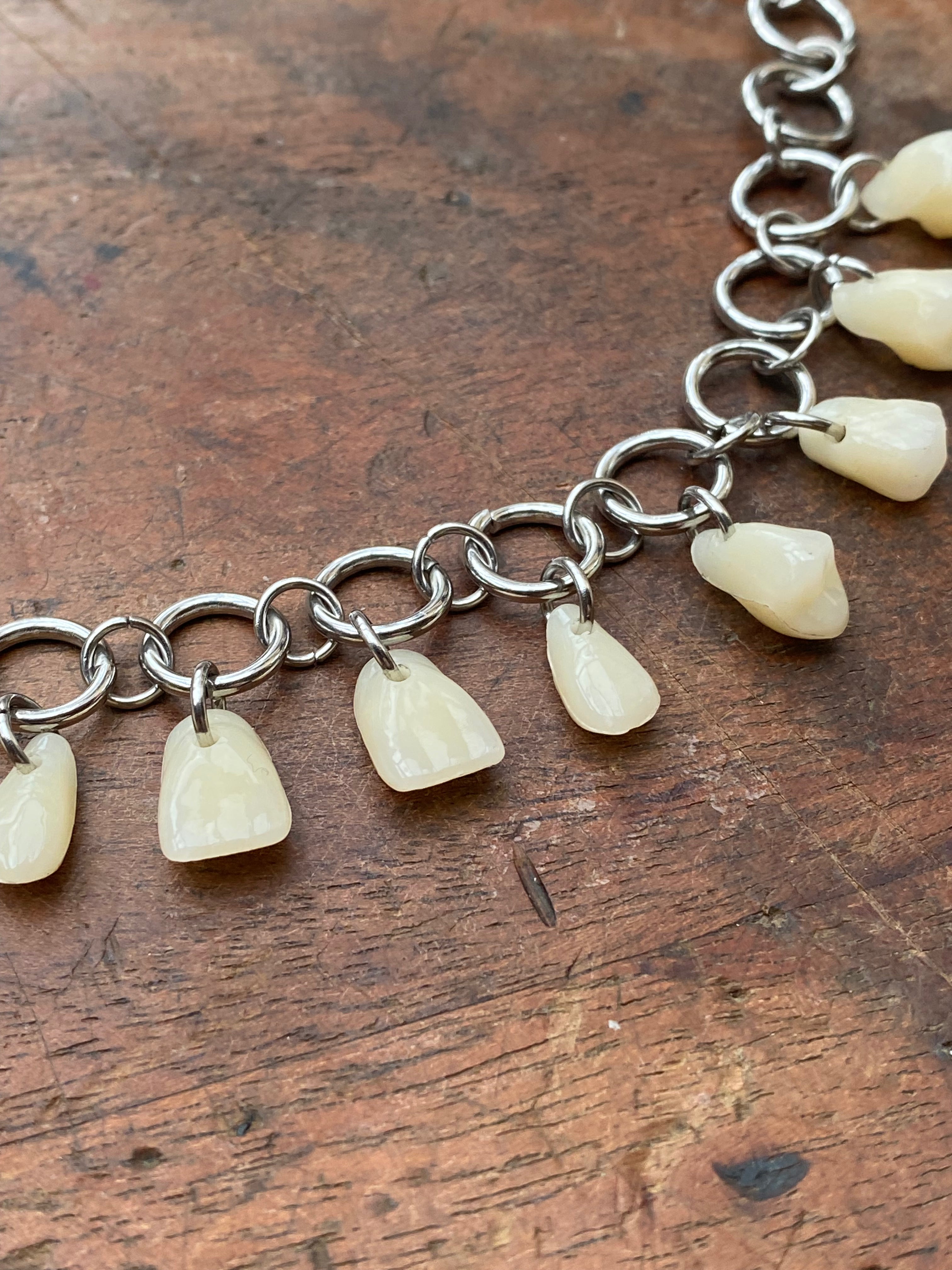 Resin Human Teeth and Steel Rings Necklace
