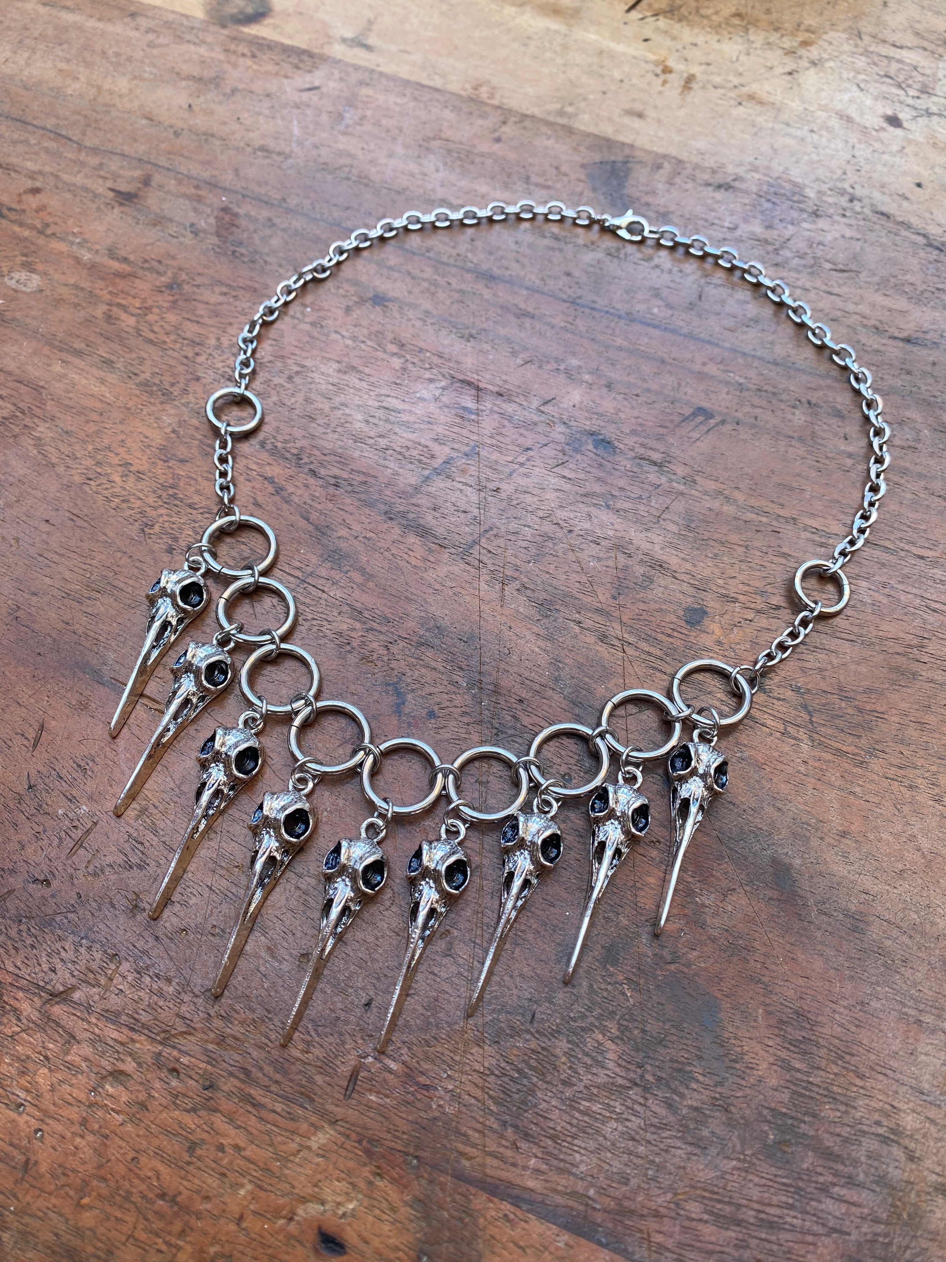 Bird Skull Charms and Steel Rings Necklace