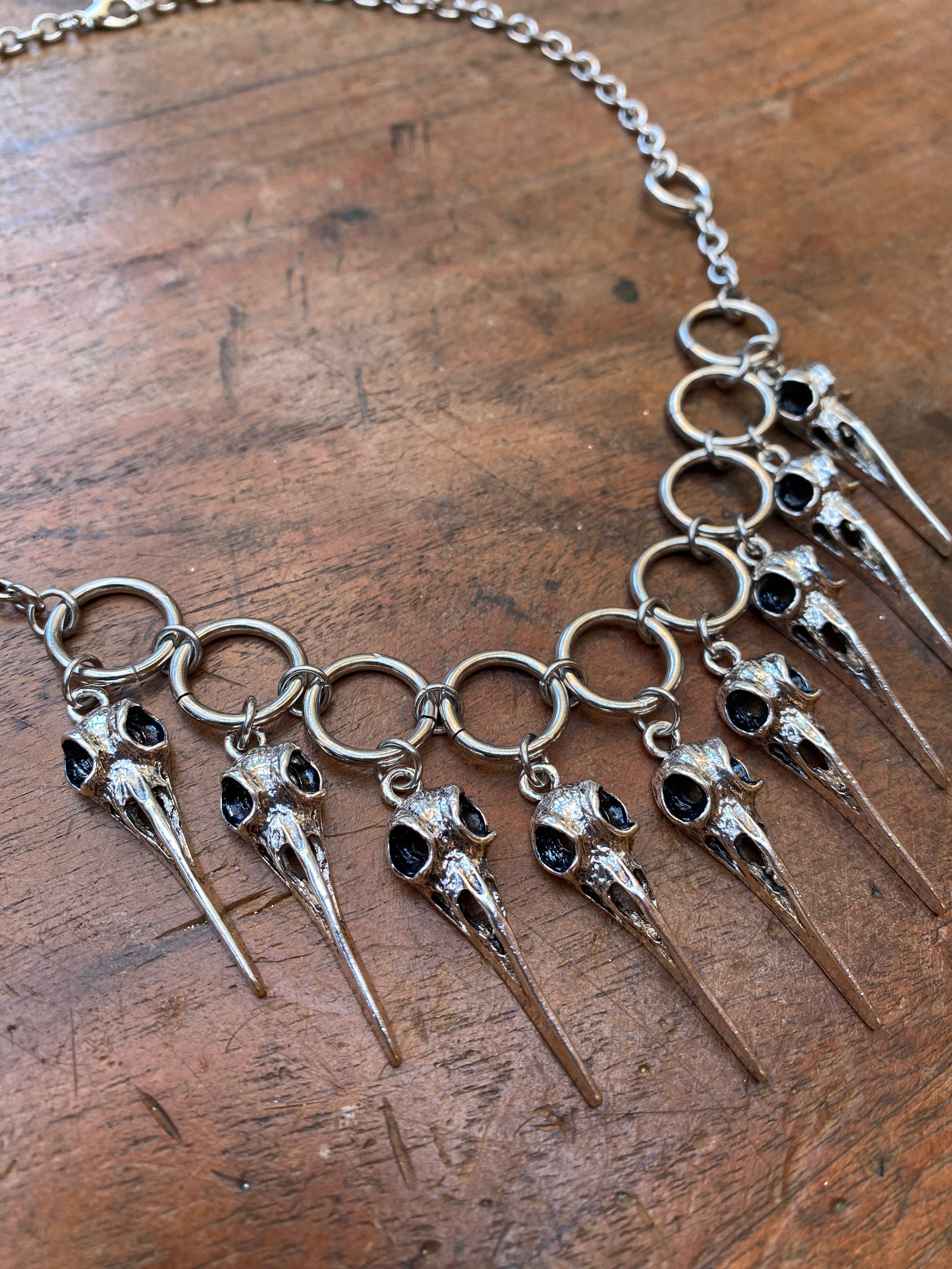 Bird Skull Charms and Steel Rings Necklace