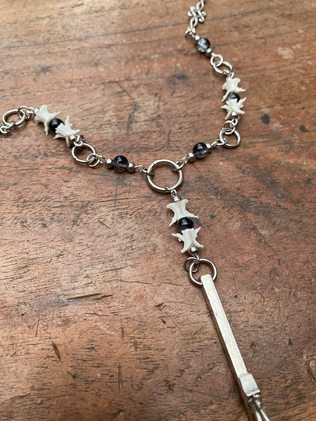 Inverted Crucifix with Snake Vertebrae Rosary Necklace