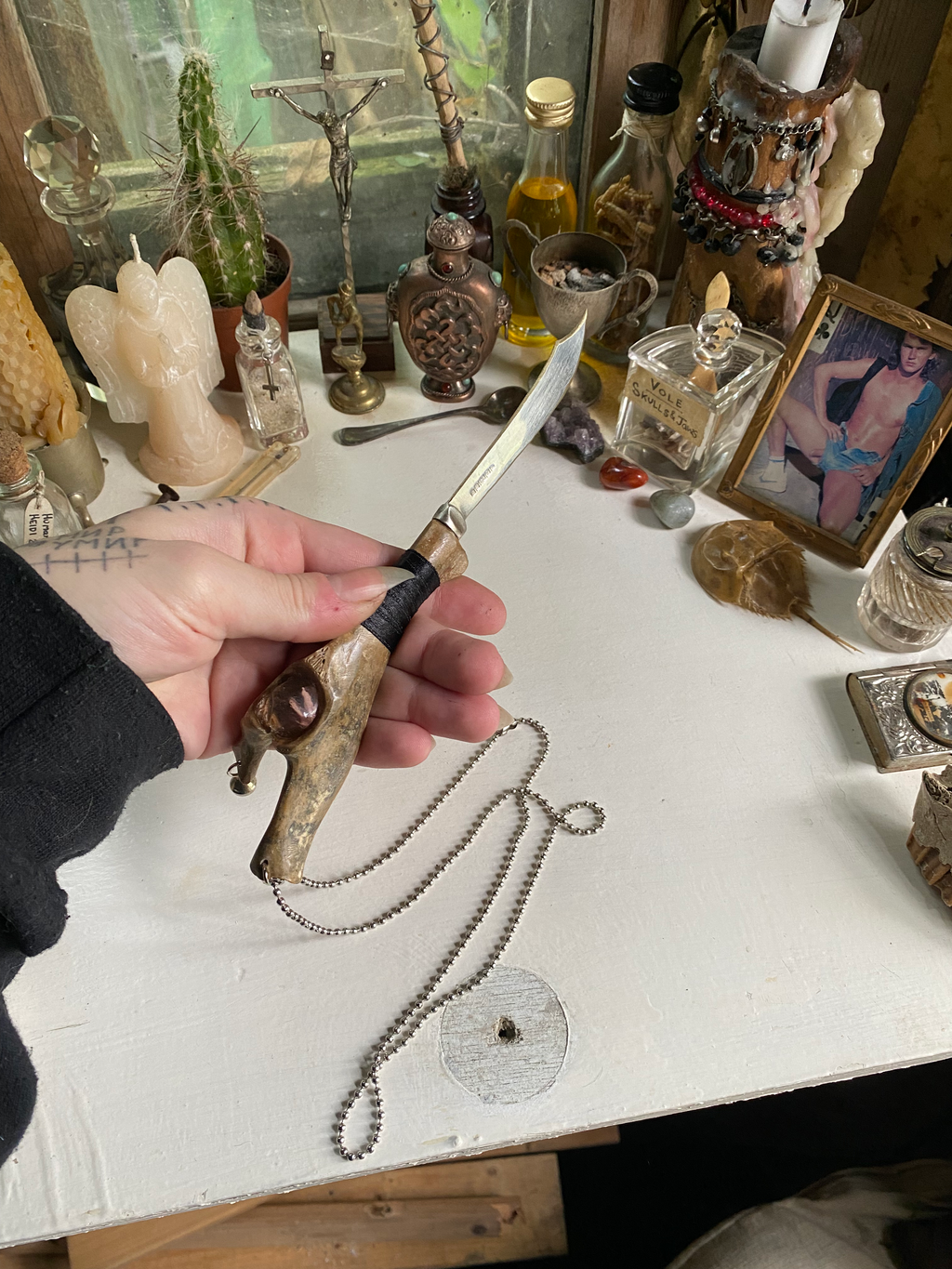 Fossilised Bone Knife with Chain, Bell and Clear Bead  image 5